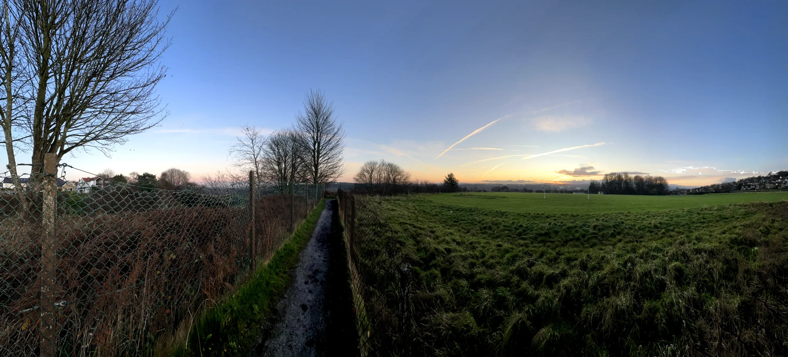 Sunset with Contrails